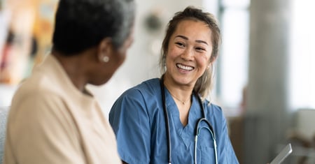 nurse talking to patient