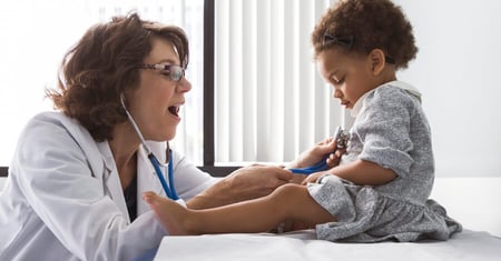 Physician providing care to patient