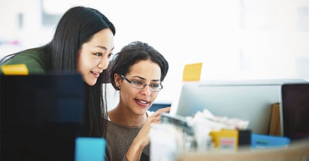 two-women-looking-at-computer