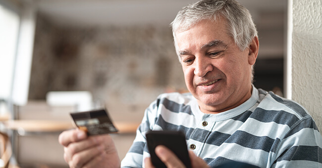 male patient making payment over the phone