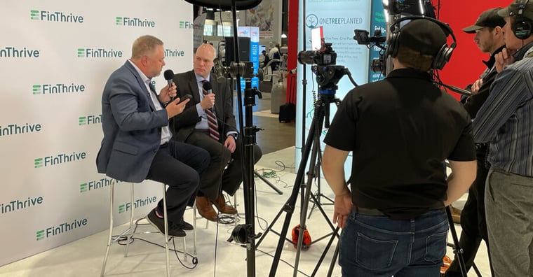 FinThrive colleague conducting interview at HIMSS 