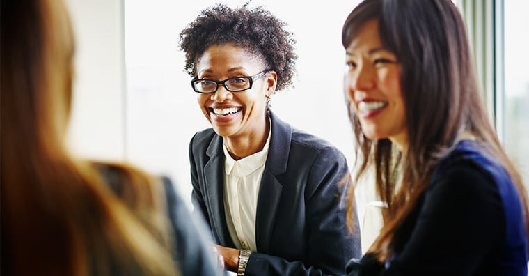 two smiling businesswomen