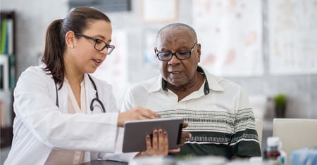 doctor helping patient