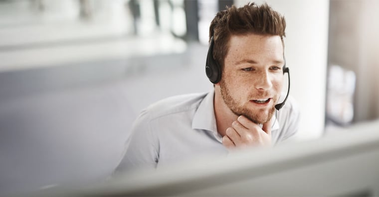 healthcare payer professional talking with headset on