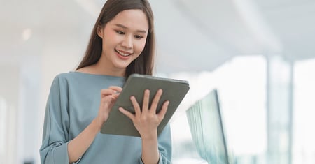 woman working on tablet